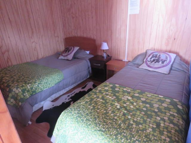 פוארטו גואדאל Hostal Y Cabanas Peumayen מראה חיצוני תמונה