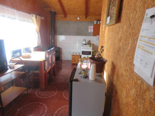 פוארטו גואדאל Hostal Y Cabanas Peumayen מראה חיצוני תמונה