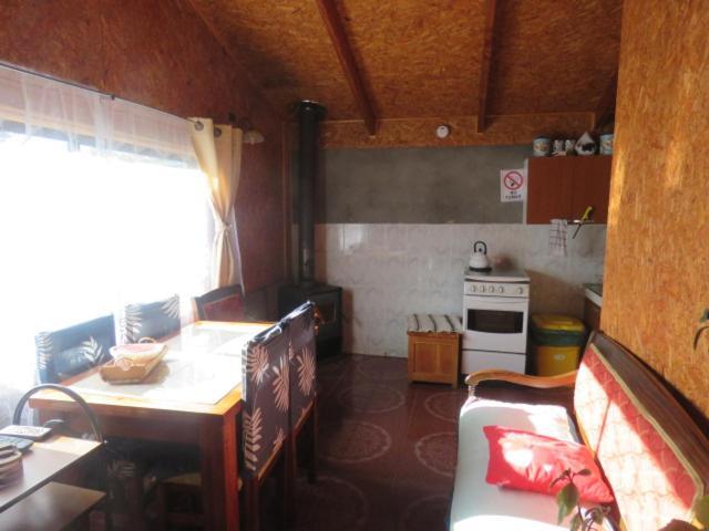פוארטו גואדאל Hostal Y Cabanas Peumayen מראה חיצוני תמונה